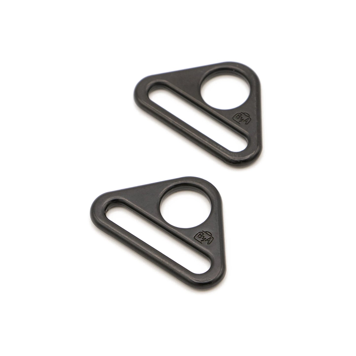 Two black triangular metal hardware pieces with circular cutouts, shown on a plain white background.