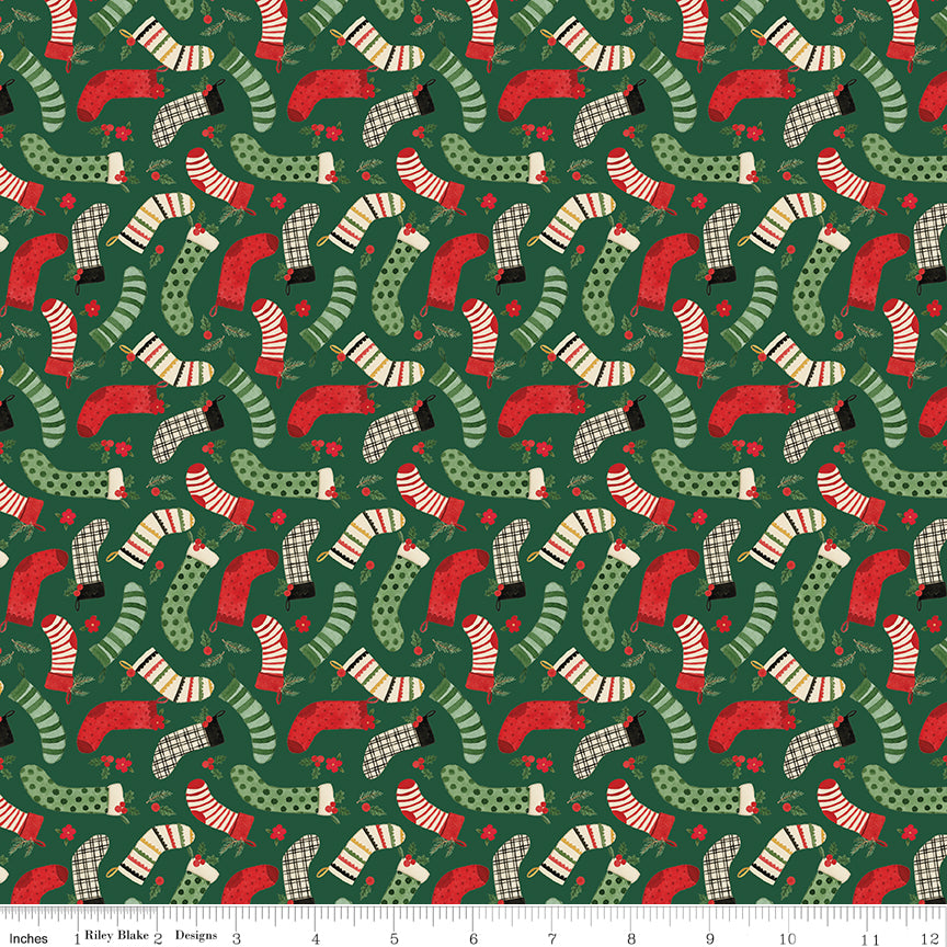 Pattern of Christmas-themed socks on a green background with a fabric swatch at the bottom.