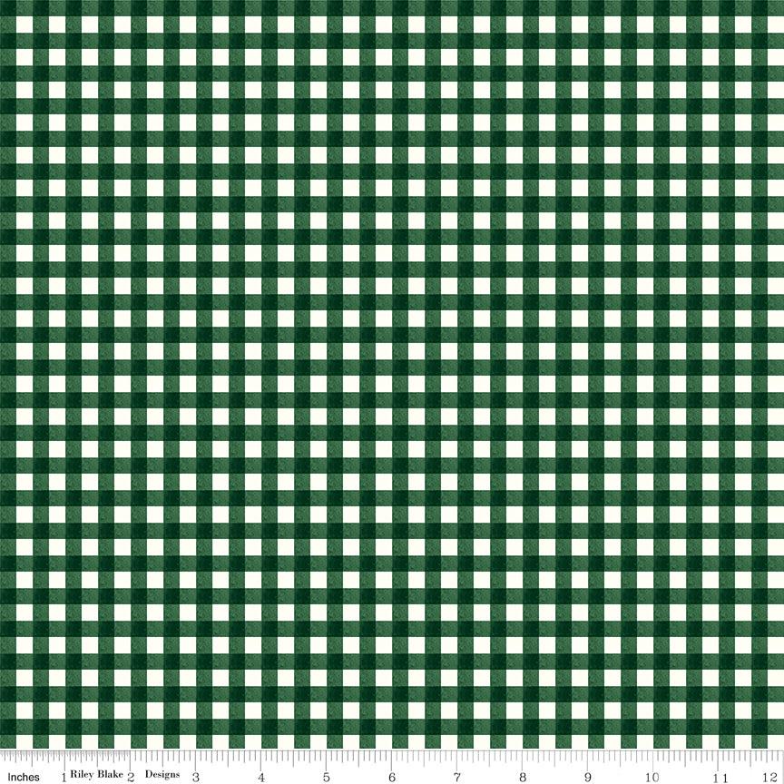 Green and white checkered pattern fabric with a ruler at the bottom.