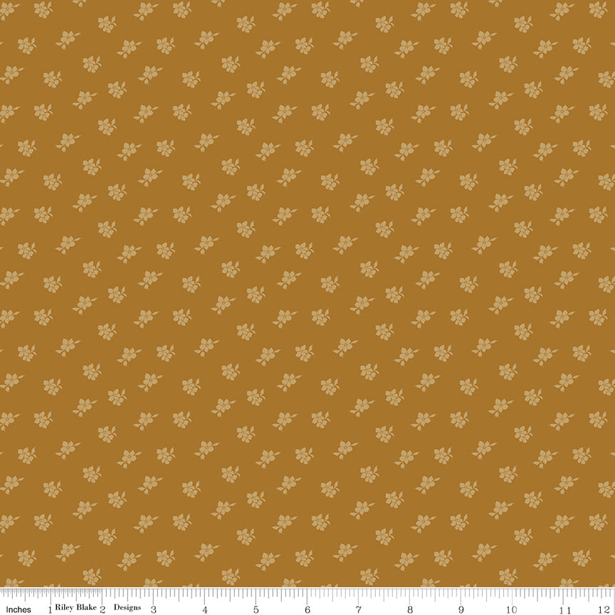 Patterned fabric with geometric design on a mustard yellow background