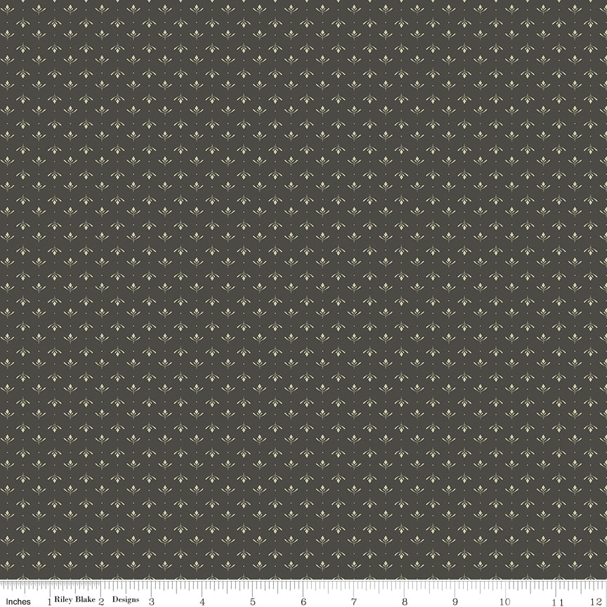 Gray fabric with geometric pattern, measurement scale at the bottom