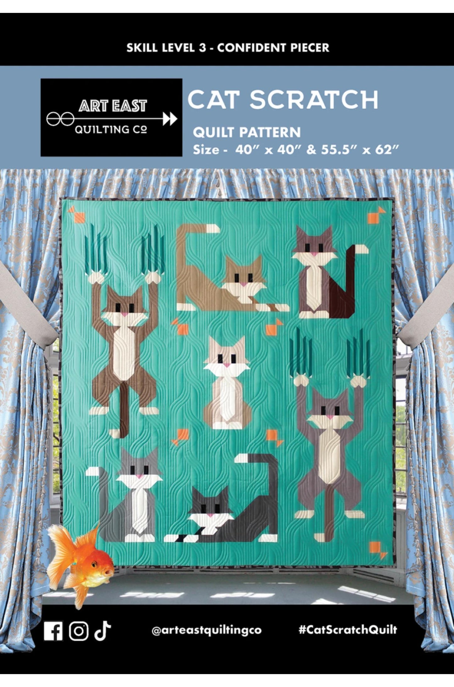 Cat Scratch quilt pattern with cartoon cats on a teal background, displayed against a fabric background.