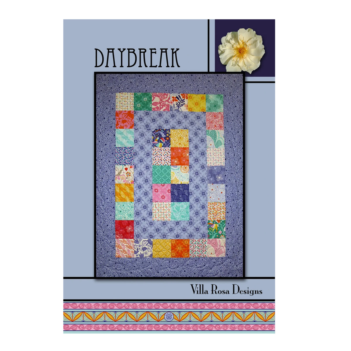 A quilt pattern cover for 'Daybreak' by Villa Rosa Designs, featuring a central patchwork quilt design with a purple floral border and multicolor square patches, set against a light blue and purple background with a decorative flower illustration.