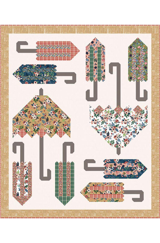Patterned umbrella designs on a white background with a beige border