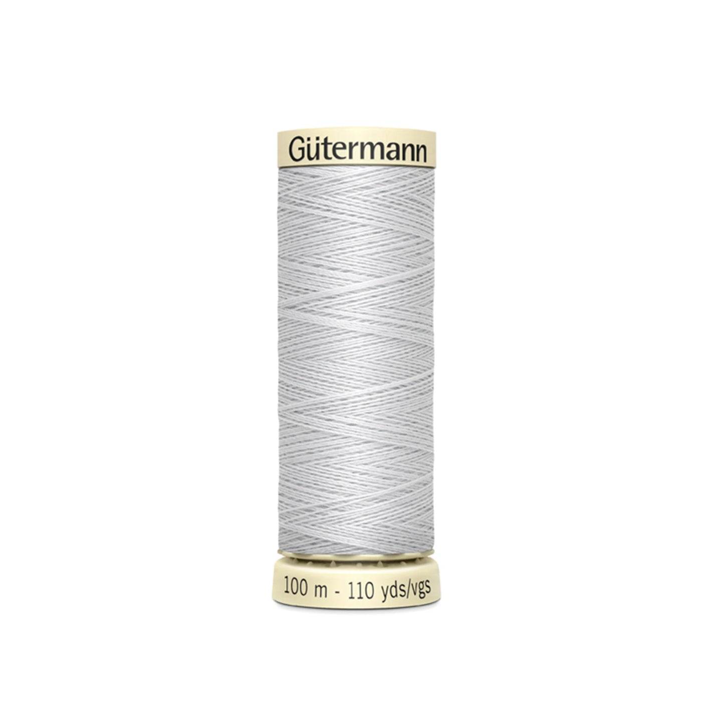 Spool of Gutermann thread on a white background