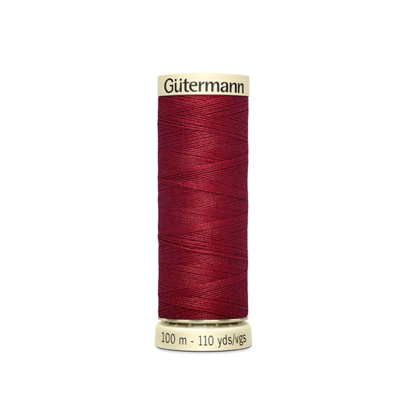 Spool of Gutermann thread on a white background