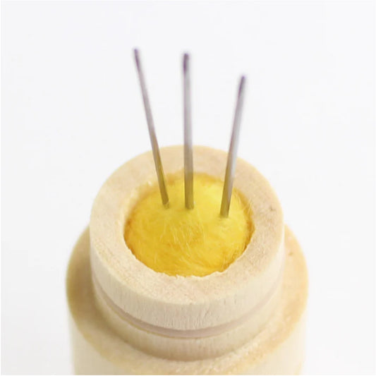 Pin cushion includes 3 needles
