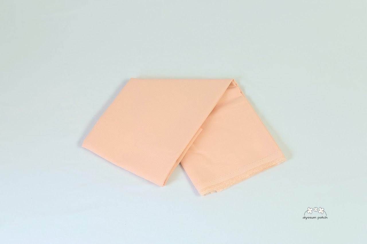 Kona Cotton Solids Ice Peach Sample cut