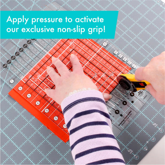 Person using a rotary cutter on a cutting mat with text about non-slip grip.