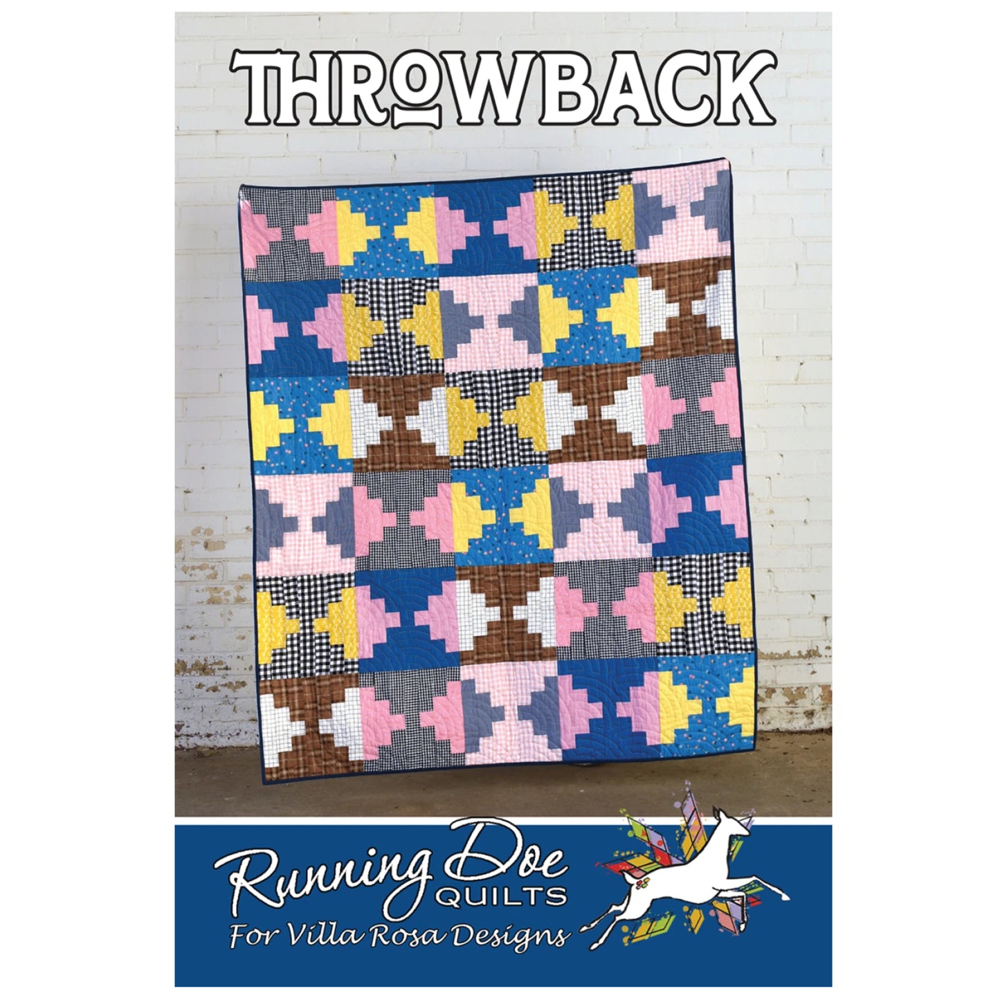 Colorful quilt with geometric pattern on a white brick wall background, featuring 'Running Doe Quilts' branding.