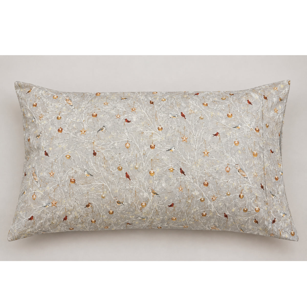 A rectangular decorative throw pillow with a textured silver-gray background featuring an all-over pattern of small birds and gold acorns on thin branches, set against a neutral light gray background.