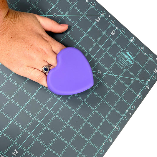 Heart Shaped Cutting Mat Cleaner in use