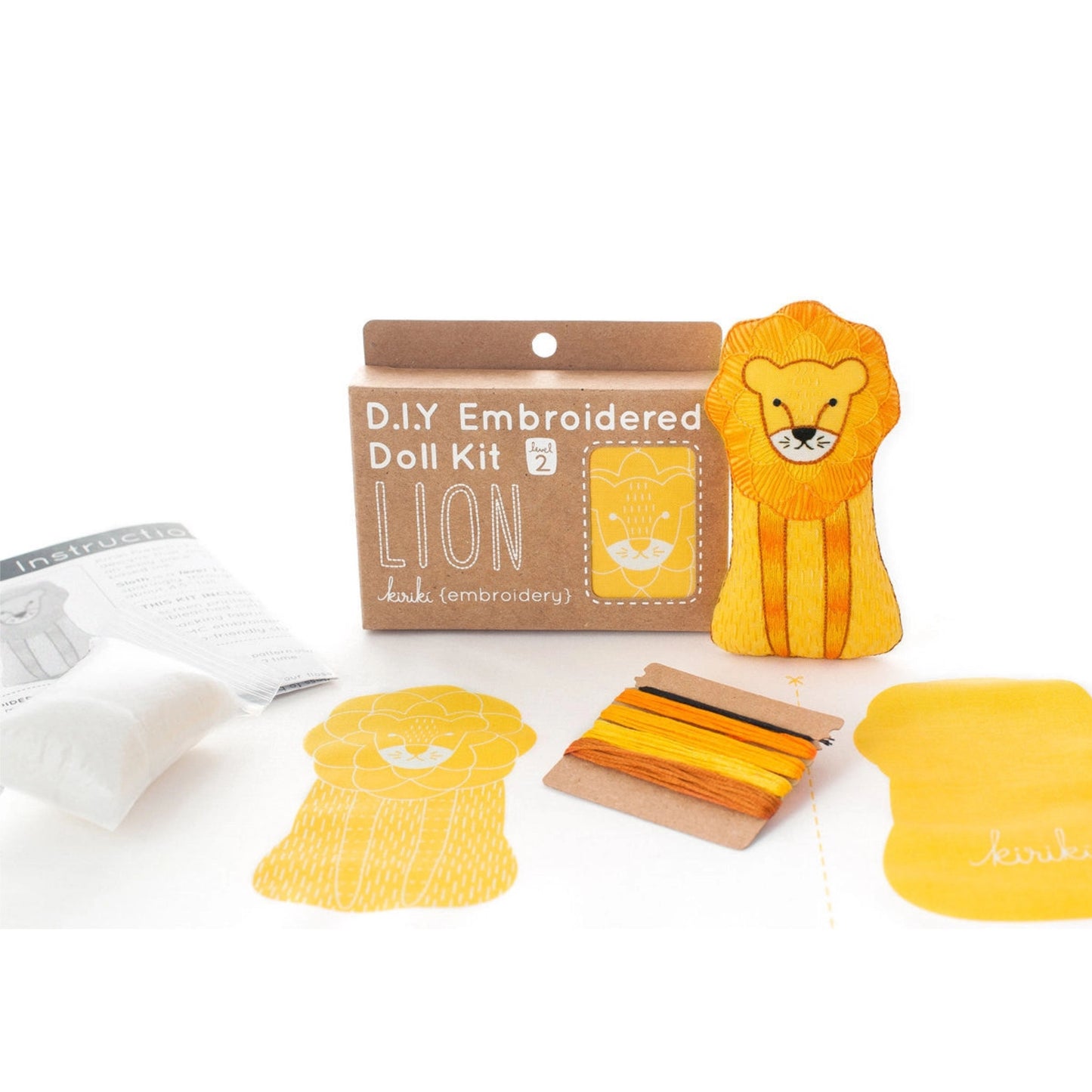 Lion Embroidered Doll kit with package and contents