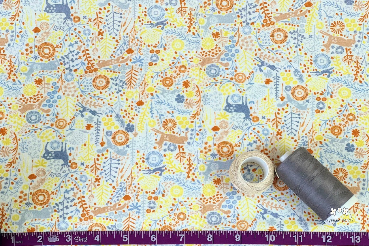 Close Up of Meadow Wildlife Fabric showing scale of print
