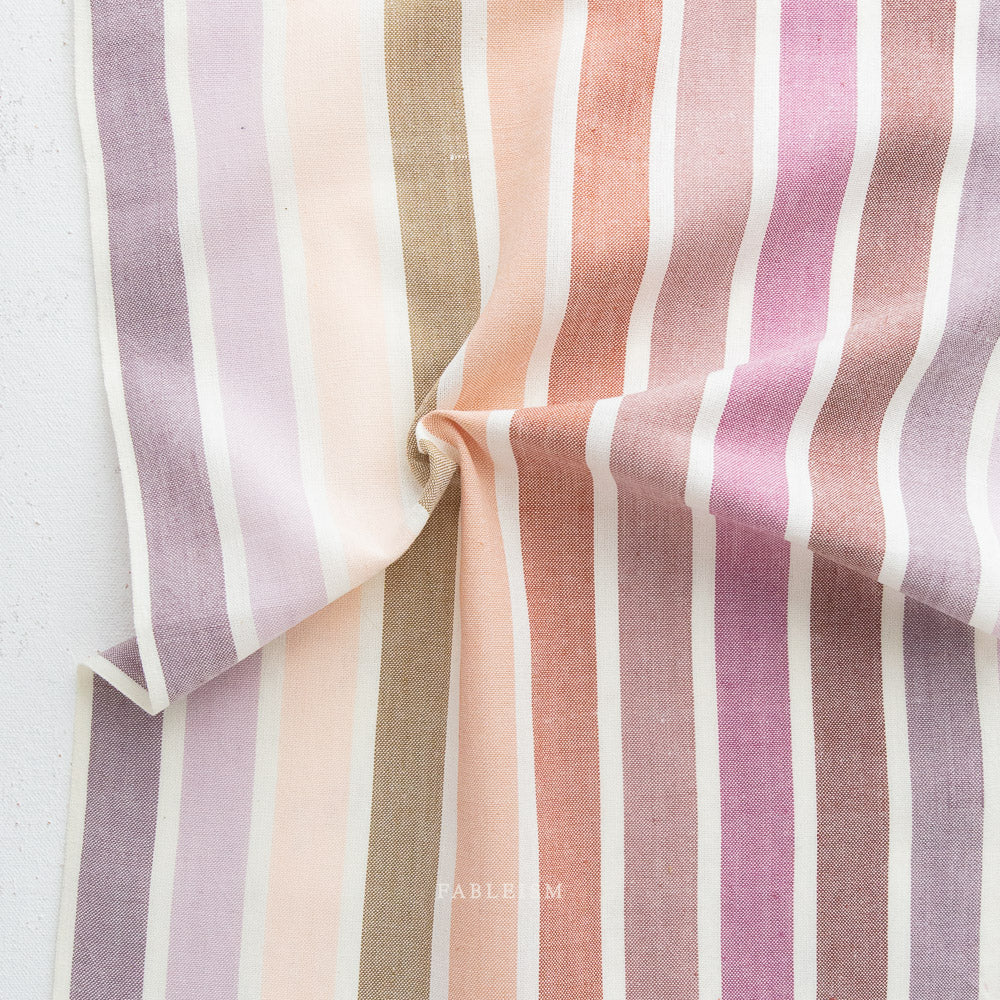 Striped fabric with pastel colors on a white background