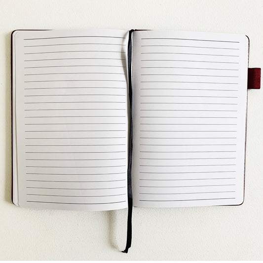 Lined pages inside Weathervane Quilt Block Journal