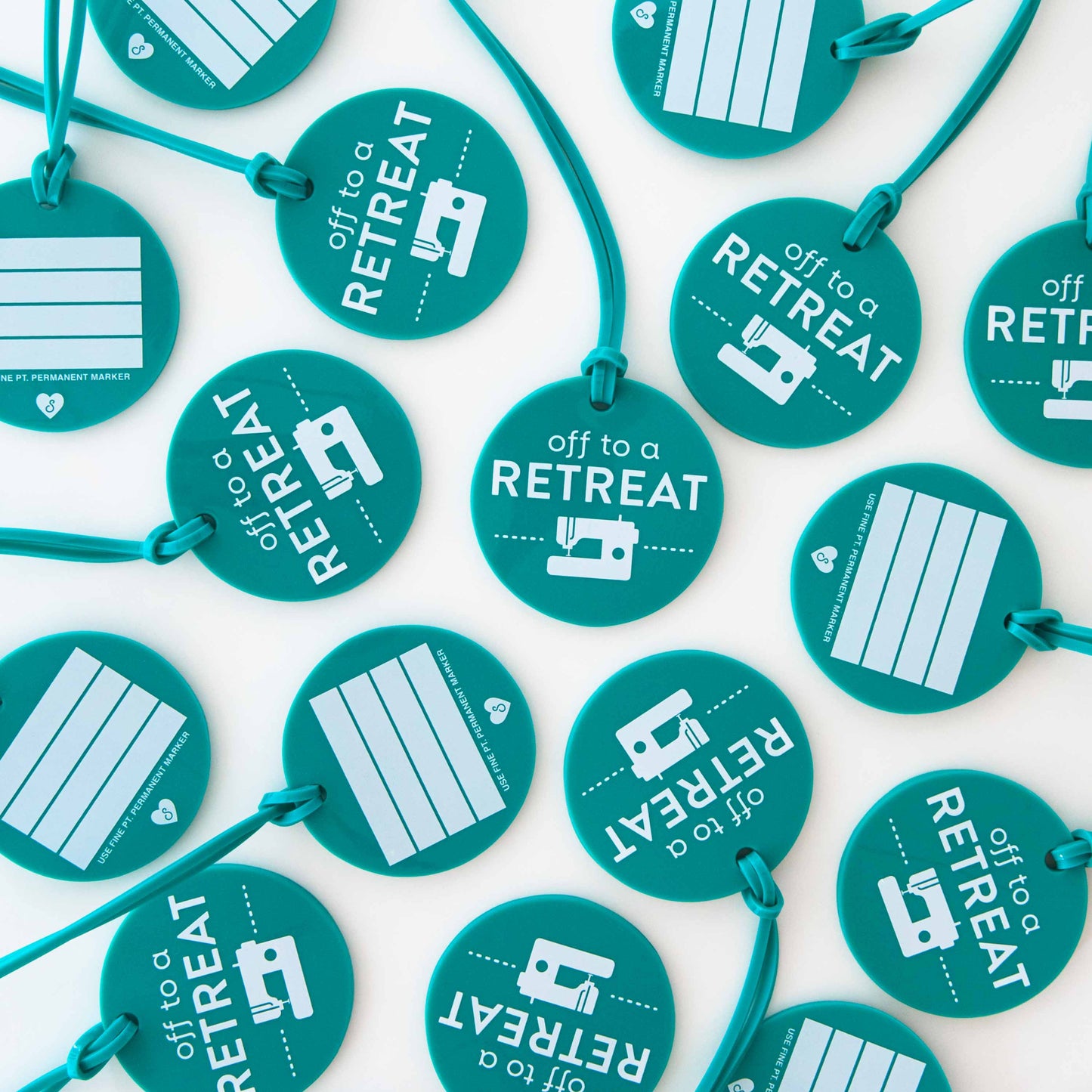 Multiple teal tags with 'off to a retreat' text and graphics on a white background
