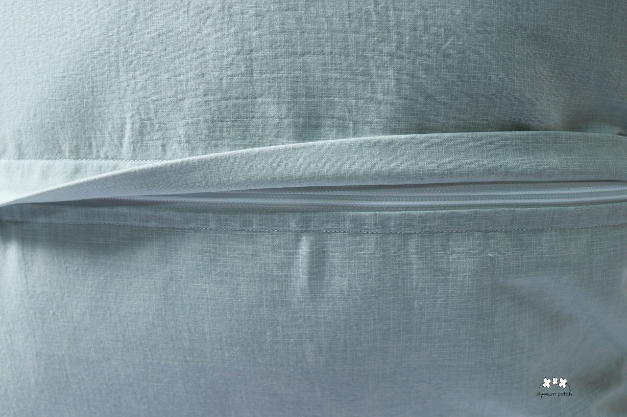Close Up of Zipper on Throw Pillow Backing