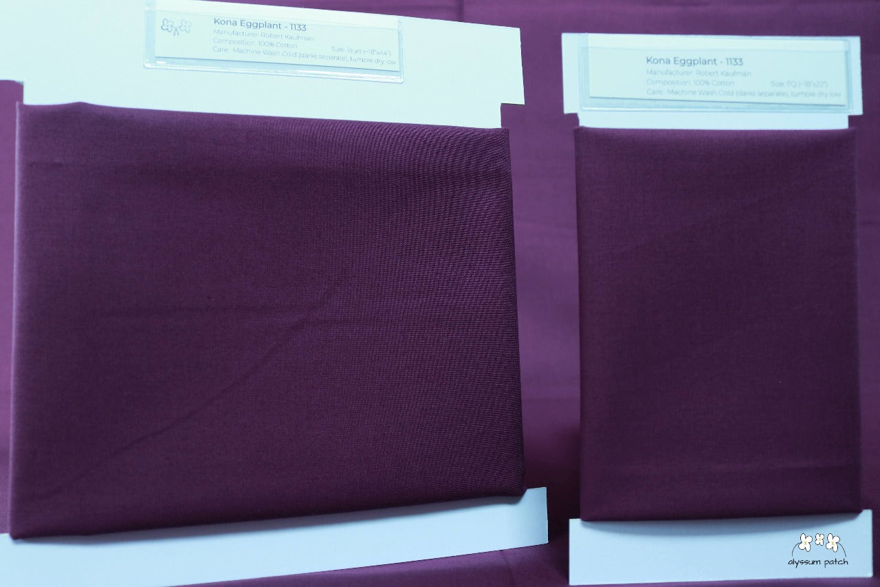 Kona Solids Eggplant precut fat quarter and half yard fabric wrapped on fabric winders