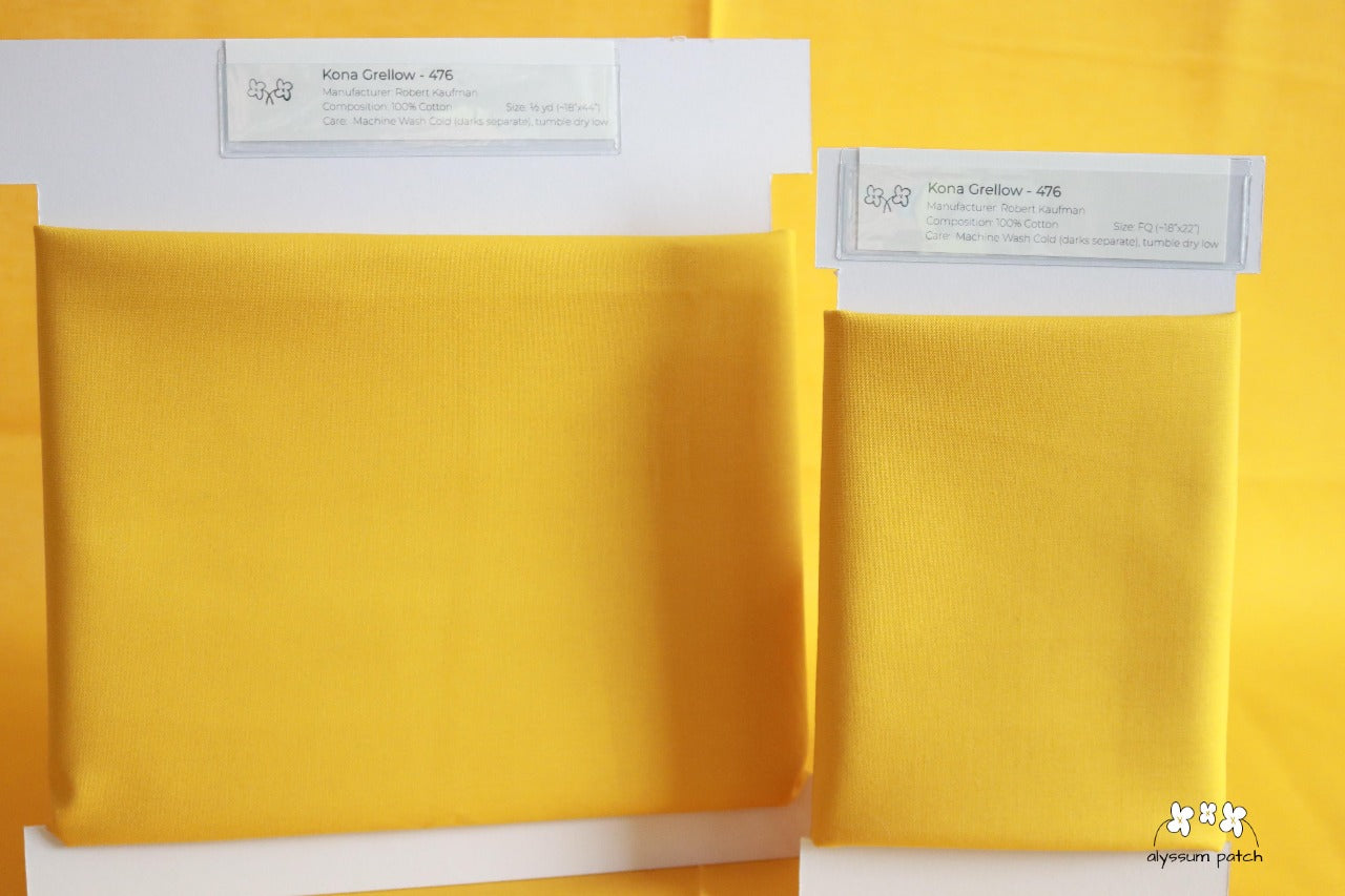 Kona Solids Grellow precut fat quarter and half yard fabric wrapped on fabric winders