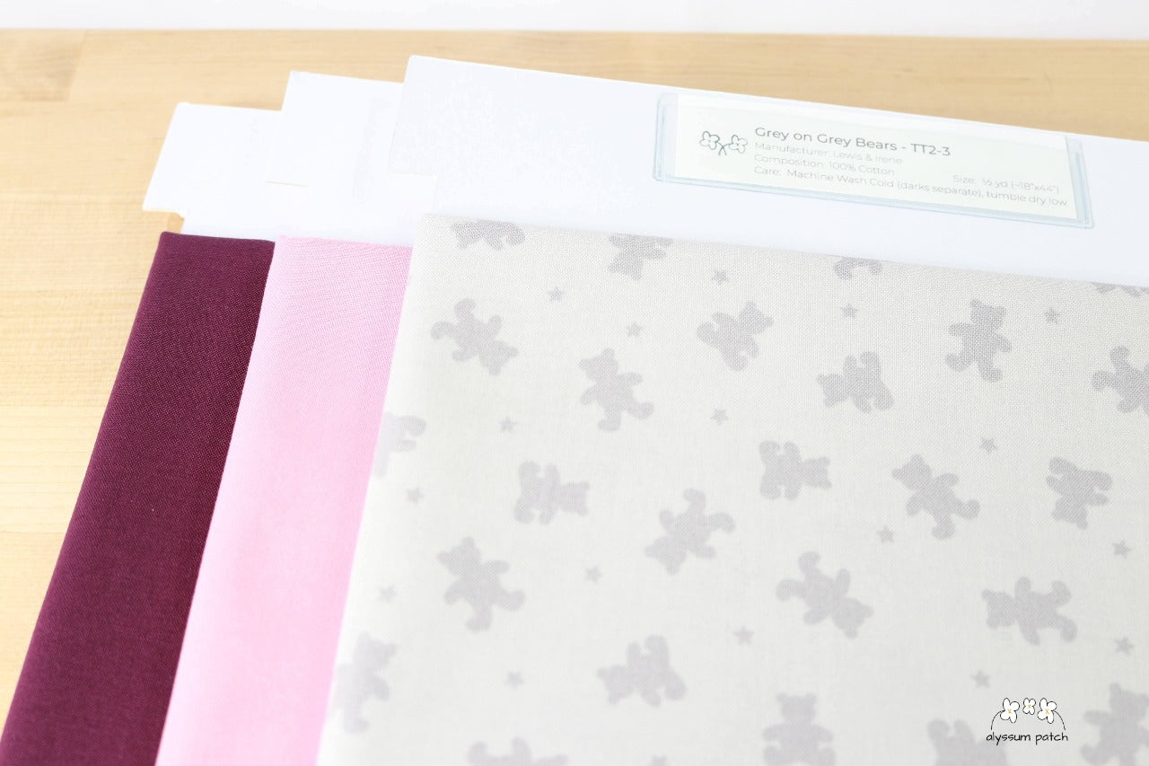Grey on Grey Bears precut fabric paired with Kona Solids Wood Rose and Kona Solids Eggplant