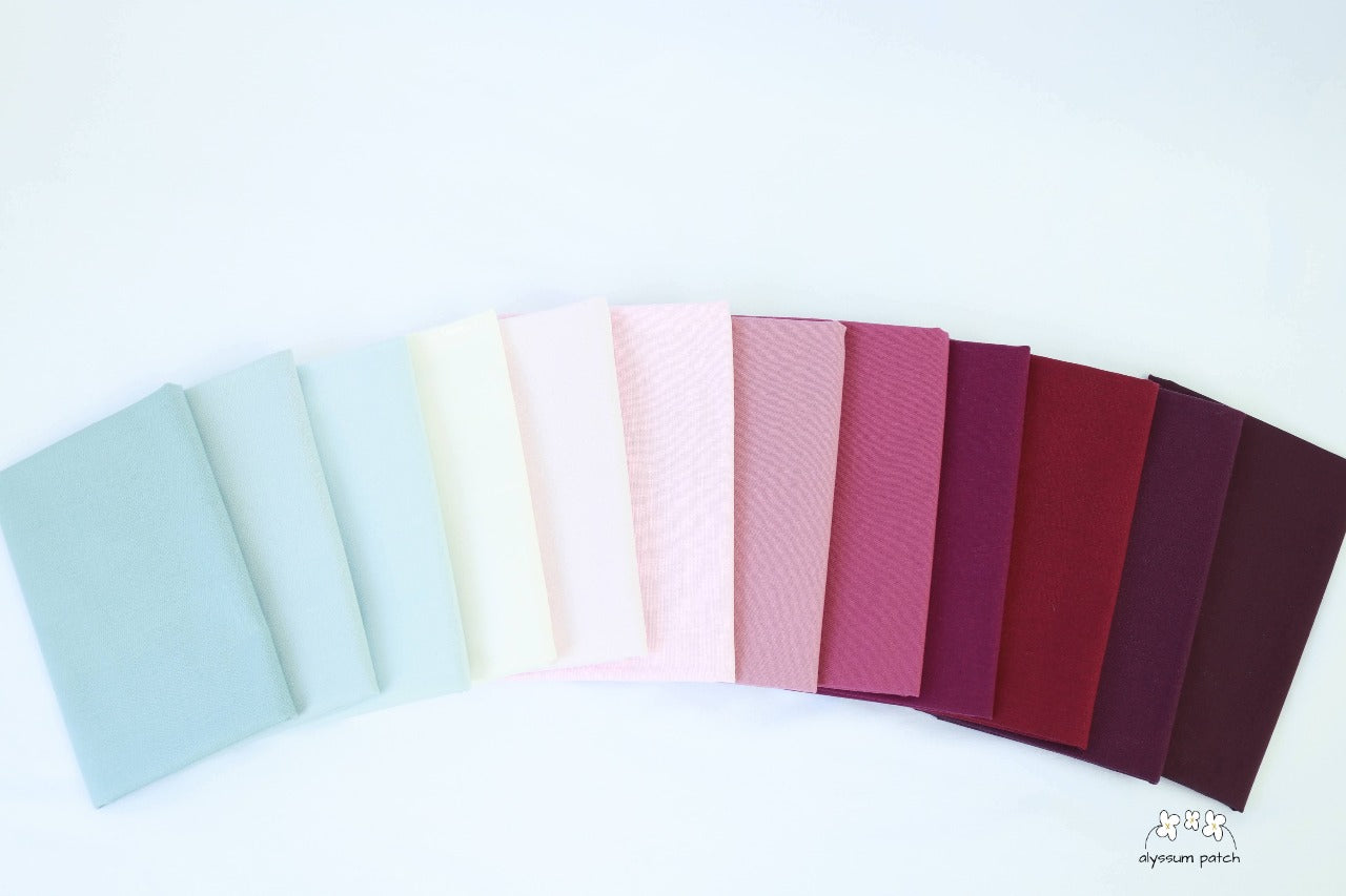 lupine fabric bundle with fabric fanned out