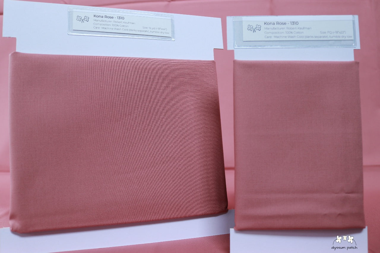 Kona Solids Rose precut fat quarter and half yard fabric wrapped on fabric winders