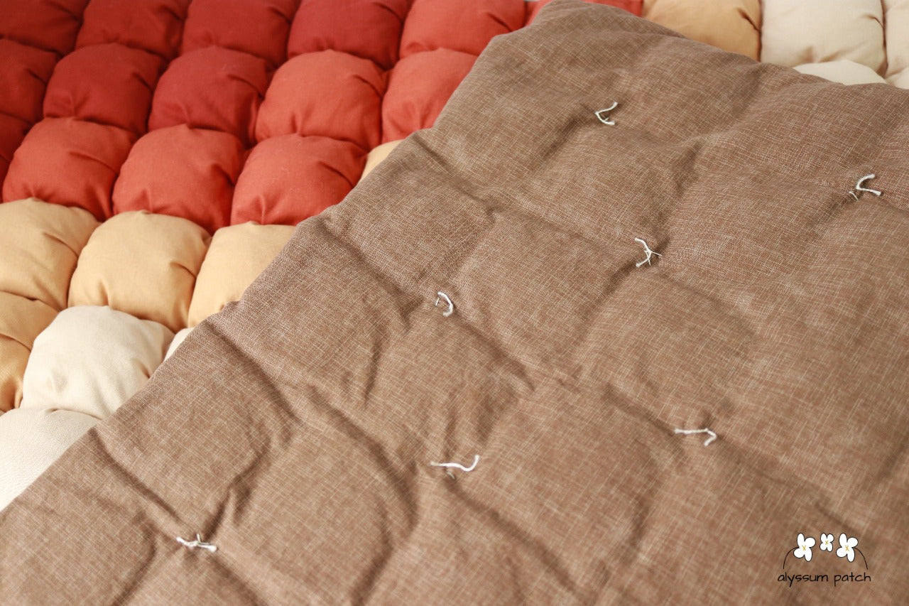 Back of Sandalwood Patchwork Puff Quilt