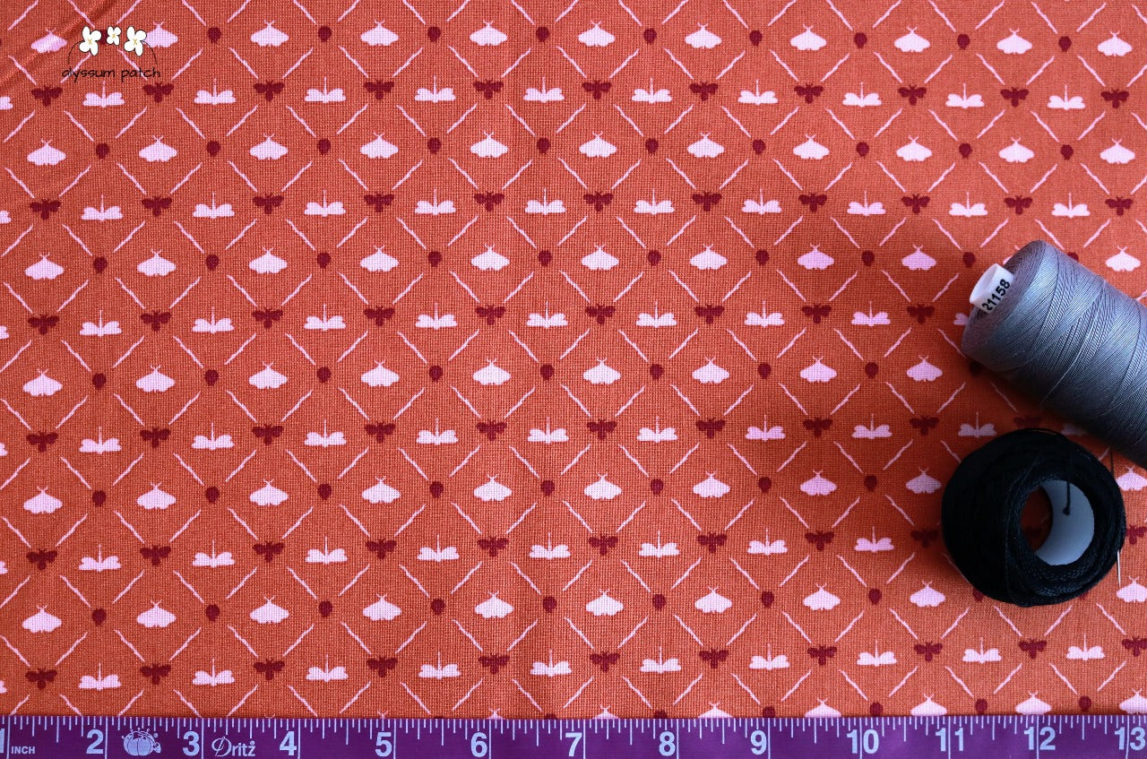 Summer School fabric with tape measurer and spools of thread to show scale of pattern image