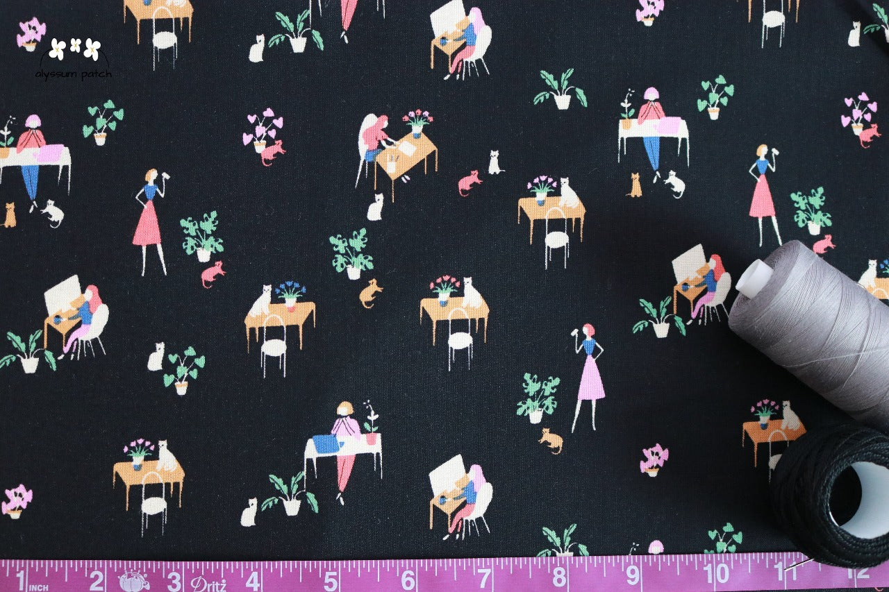 At the Library fabric with measuring tape and spools of thread to show scale of pattern image