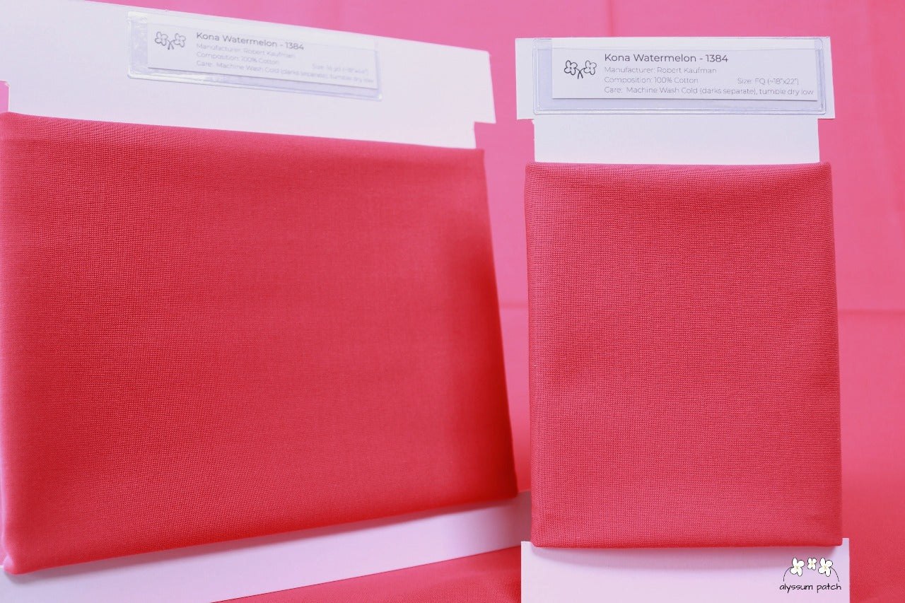Kona Solids Watermelon precut fat quarter and half yard fabric wrapped on fabric winders