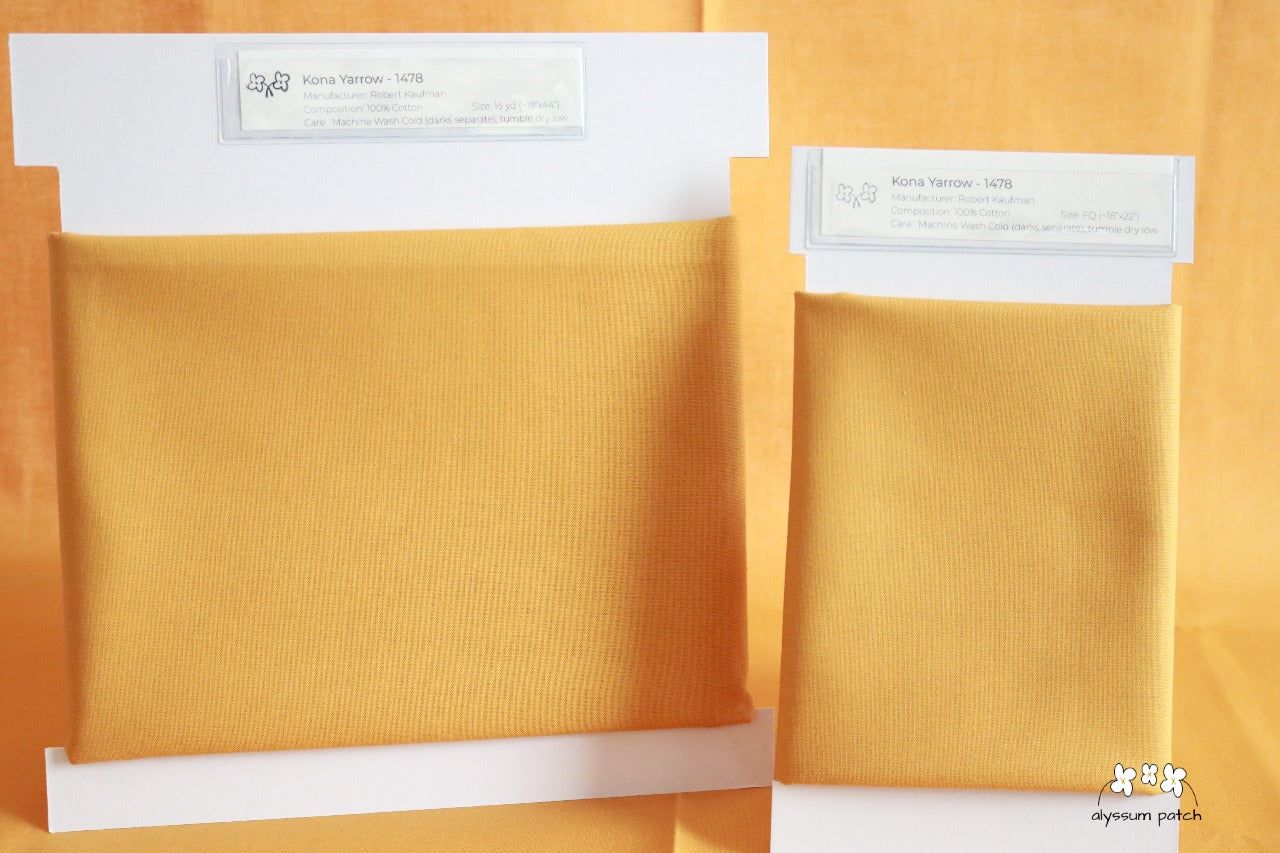 Kona Solids Yarrow precut fat quarter and half yard fabric wrapped on fabric winders