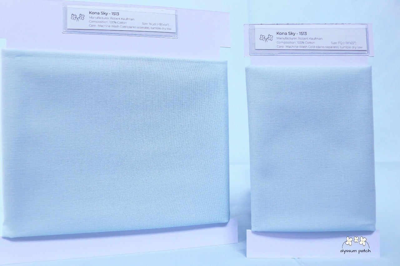 Kona Solids Sky precut fat quarter and half yard fabric wrapped on fabric winders