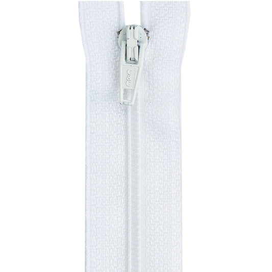 Close-up of a white textured fabric with a silver zipper on a white background
