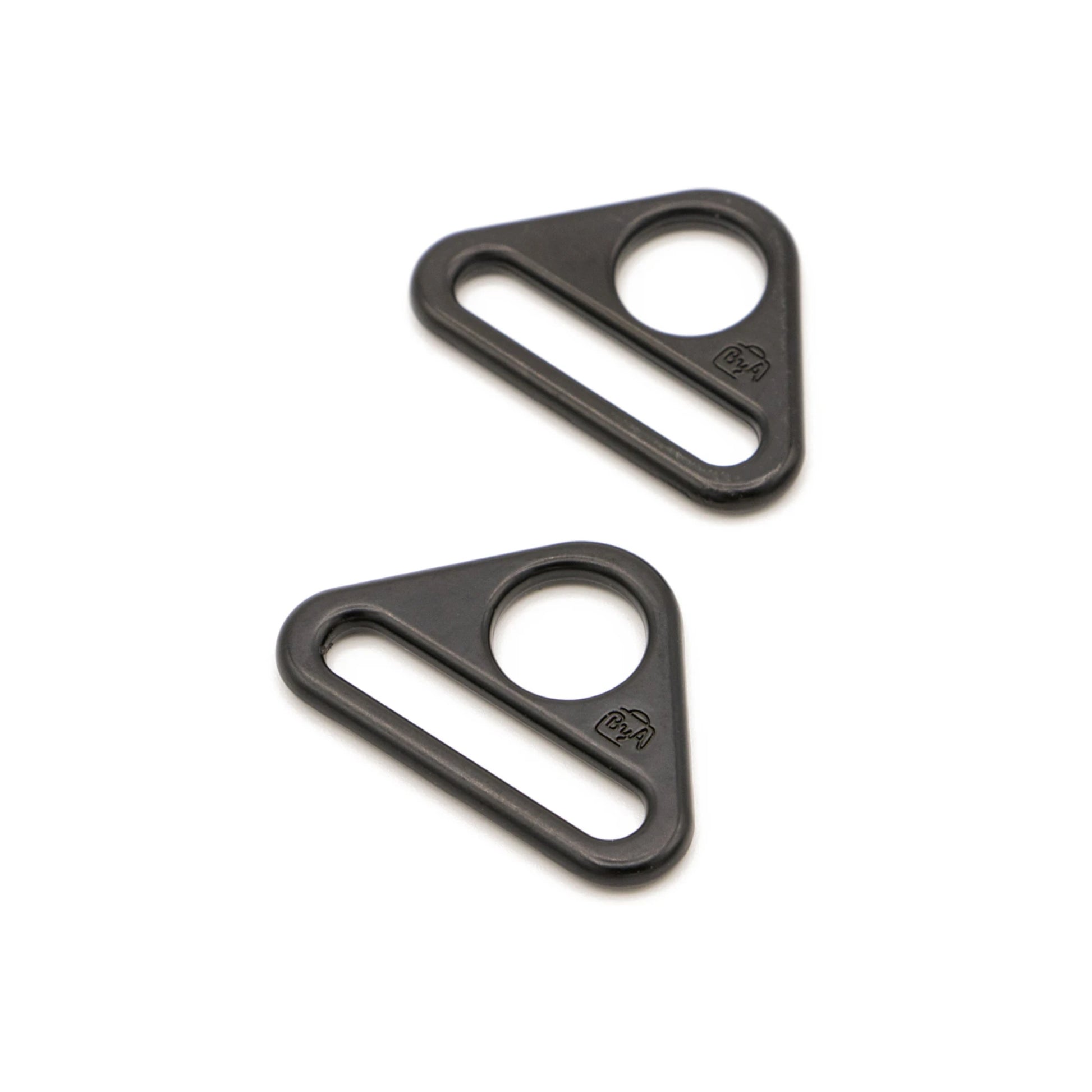 Two black triangular metal hardware pieces with circular cutouts, shown on a plain white background.