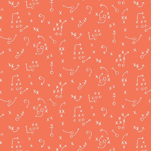 White football play diagrams on an orange background