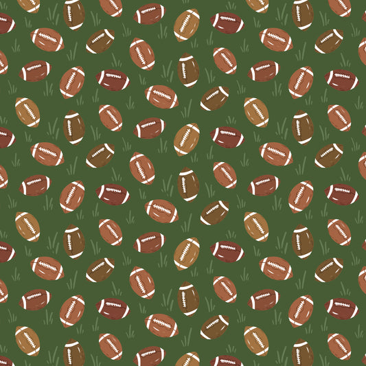 Pattern of footballs on a green background