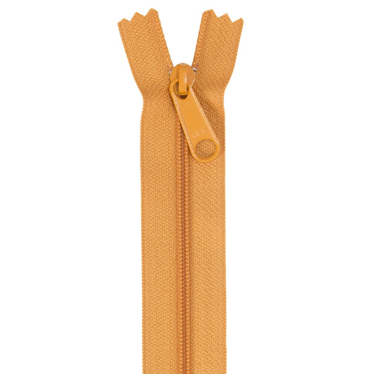 A single orange zipper with a matching pull tab, shown vertically against a plain white background.