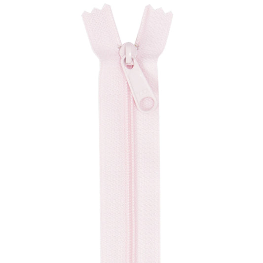 Pale pink zipper on a white background
