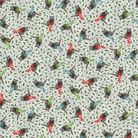 A repeating pattern of small raccoons knitting socks in red, green, blue, and white, set against a light cream background with tiny green leaf motifs.