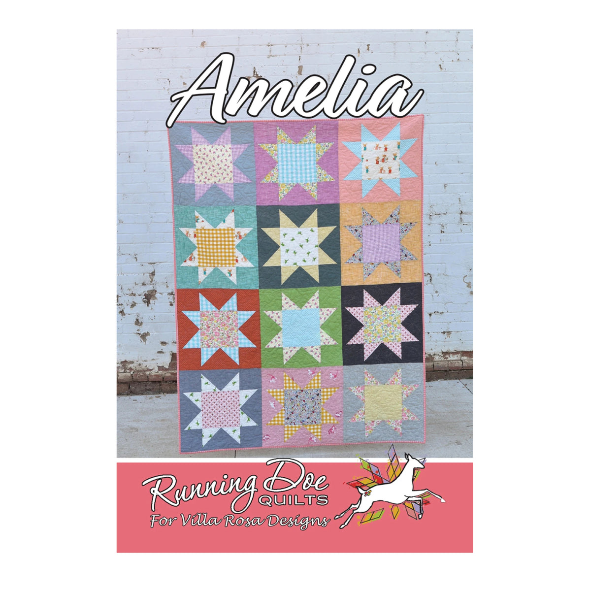 A quilt pattern cover titled 'Amelia' showing a colorful patchwork star quilt against a white painted wood wall, with the brand text 'Running Dog Quilts for Villa Rosa Designs' at the bottom.