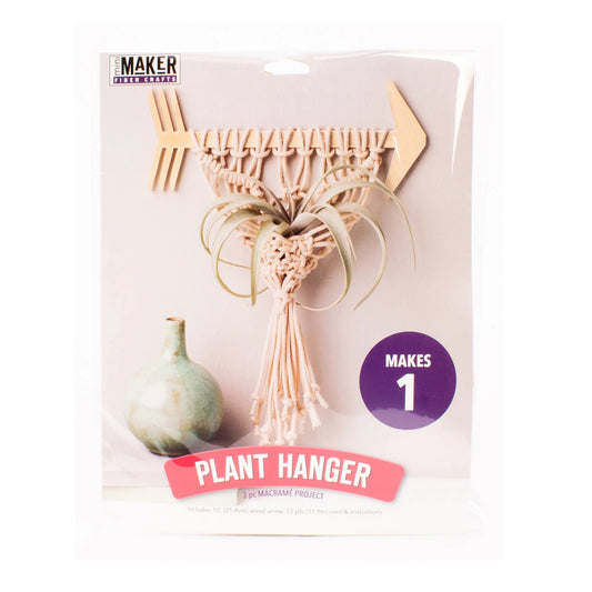 Macrame plant hanger kit packaging with a plant and vase on a white background
