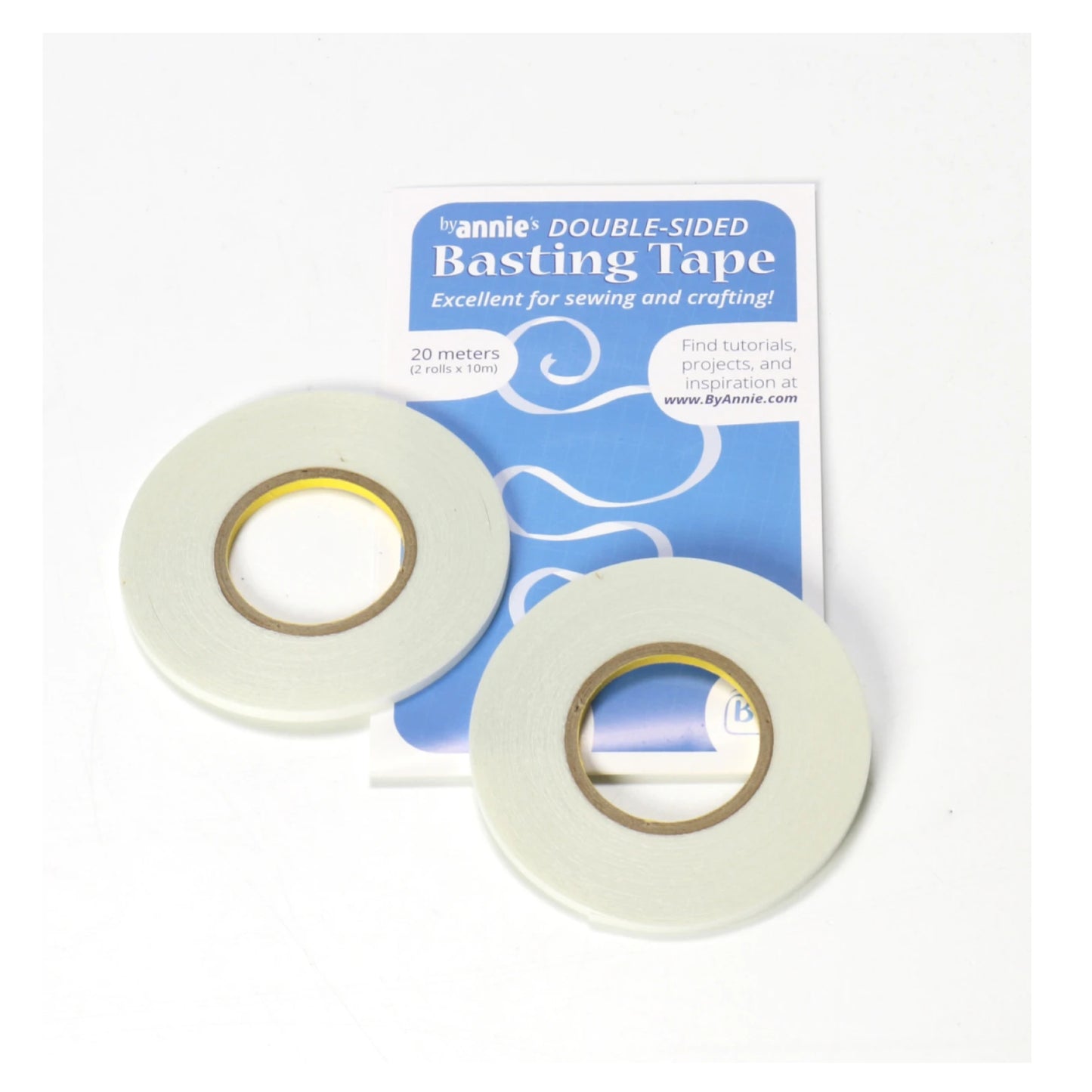 Two rolls of double-sided basting tape with packaging on a white background