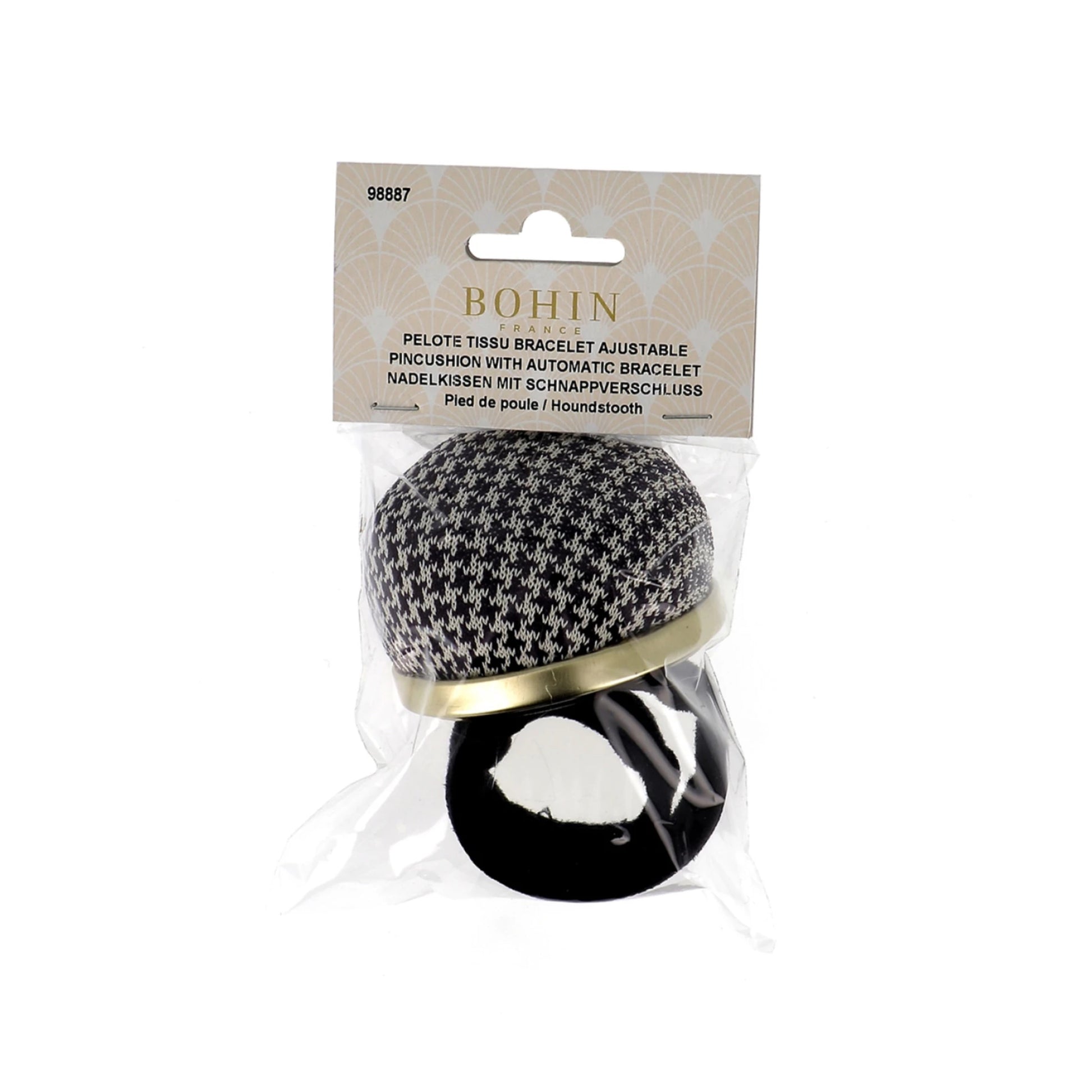 Bohin adjustable bracelet pin cushion with houndstooth pattern on a white background