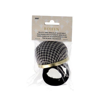 Bohin adjustable bracelet pin cushion with houndstooth pattern on a white background