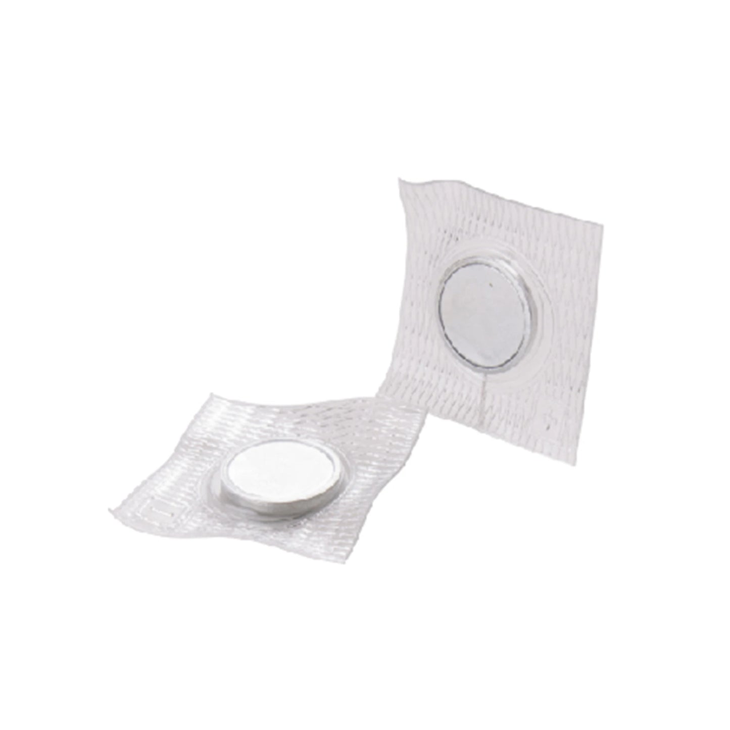 Two circular magnets on a textured white background