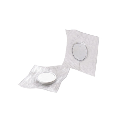 Two circular magnets on a textured white background