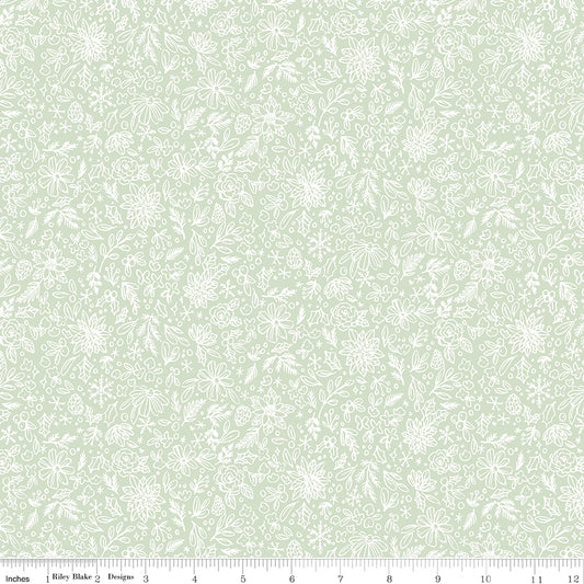 Floral patterned fabric swatch on a light green background