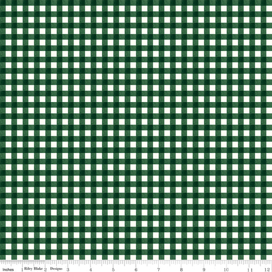 Green and white checkered pattern fabric with a ruler at the bottom.