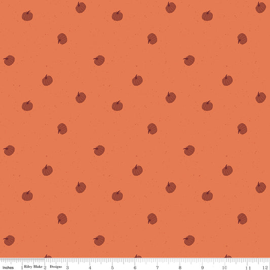 Small brown pumpkins pattern on an orange background